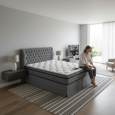 Dormitorio de lujo gris con cama Chesterfield diseño de tapizado, camas dobles de lujo.