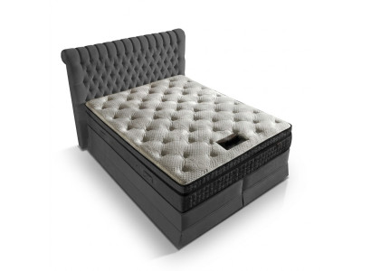 Dormitorio de lujo gris con cama Chesterfield diseño de tapizado, camas dobles de lujo.