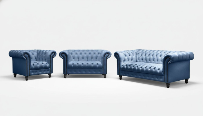 Sofá Chesterfield de tres plazas, tapizado en tela de lujo.