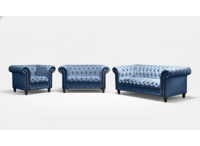 Sofá Chesterfield de tres plazas, tapizado en tela de lujo.