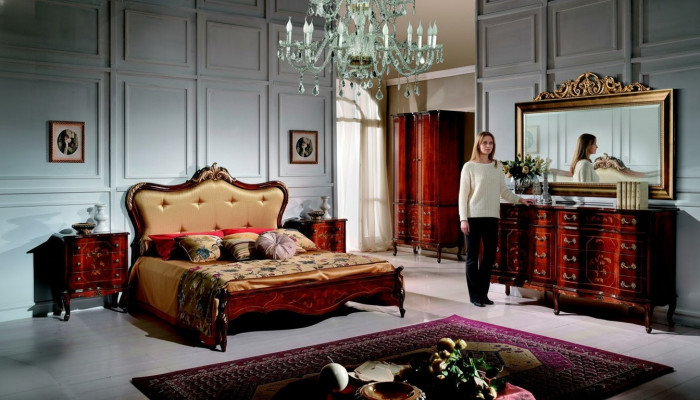 Cama clásica Chesterfield con pedrería de Swarovski, cama doble tapizada.