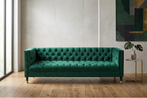 Chesterfield sofá de lujo de 4 plazas en verde de tela.