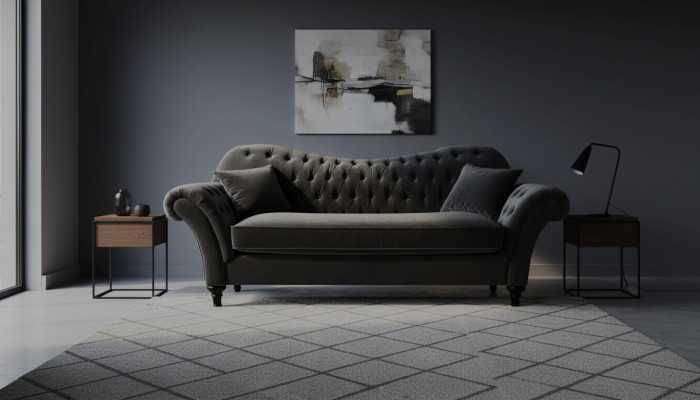 Sofá de tela negro de tres plazas Chesterfield para la sala de estar.