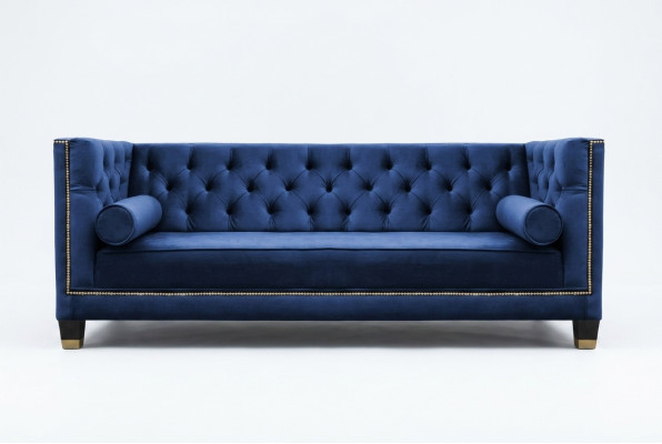 Sofá de diseño de tres plazas Chesterfield azul de tela para la sala de estar.