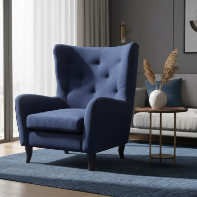 Sillón de tela de terciopelo Chesterfield azul contemporáneo en el salón.