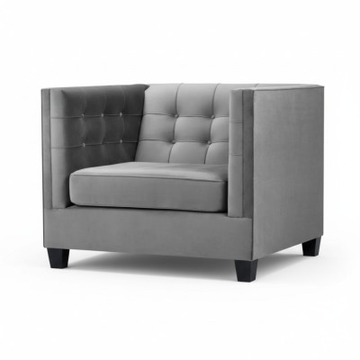Sillón Chesterfield de tela gris nuevo de estilo moderno para la sala de estar.