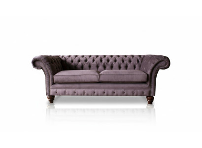 Sofá Chesterfield tapizado clásico de cuero y textil de 3 plazas.