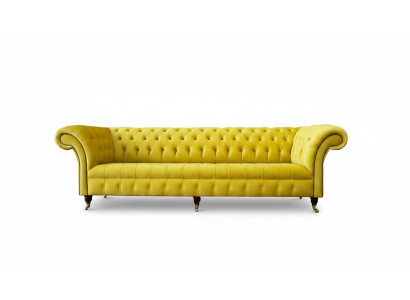 Sofá amarillo de 4 plazas Chesterfield con tapicería de cuero y tela amarilla.