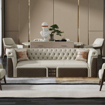 Sofá de tres plazas estilo moderno Chesterfield de cuero.