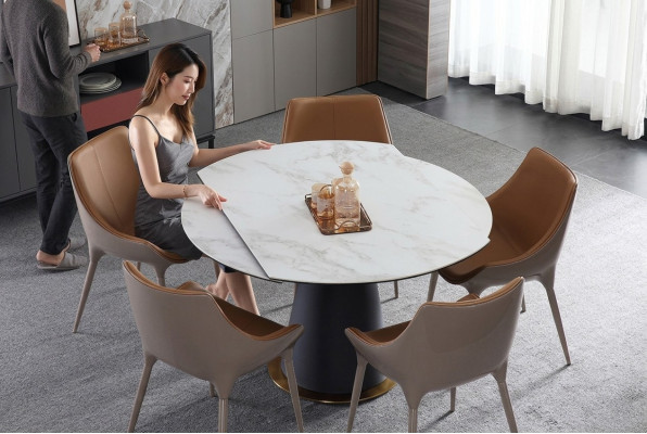 Una elegante mesa redonda de comedor para su comedor en estilo moderno