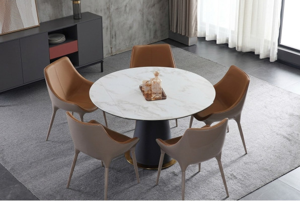 Una elegante mesa redonda de comedor para su comedor en estilo moderno