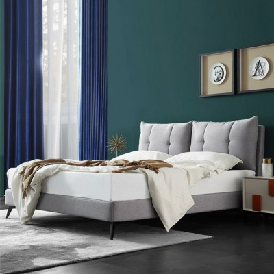 Doble cama de hotel en cuero beige de 180x200 diseño de dormitorio con cabecero acolchado.
