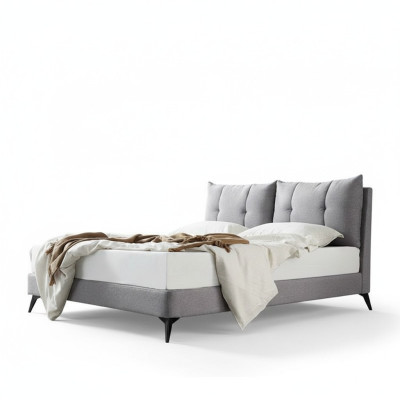 Doble cama de hotel en cuero beige de 180x200 diseño de dormitorio con cabecero acolchado.