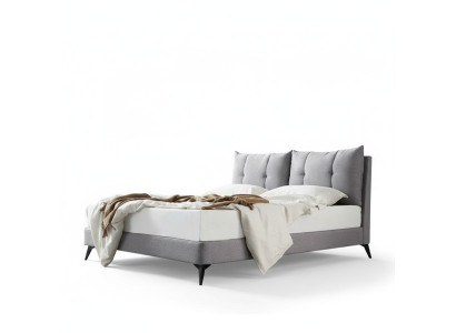 Doble cama de hotel en cuero beige de 180x200 diseño de dormitorio con cabecero acolchado.