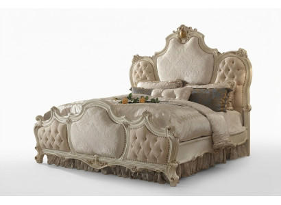 Cama de lujo con diseño acolchado doble para habitación de hotel matrimonial.