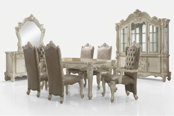 Juego de comedor blanco de diseñador: mesa de comedor, sillas, cómoda y espejo.