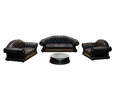 Sofá Chesterfield clásico de cuero de tres plazas.