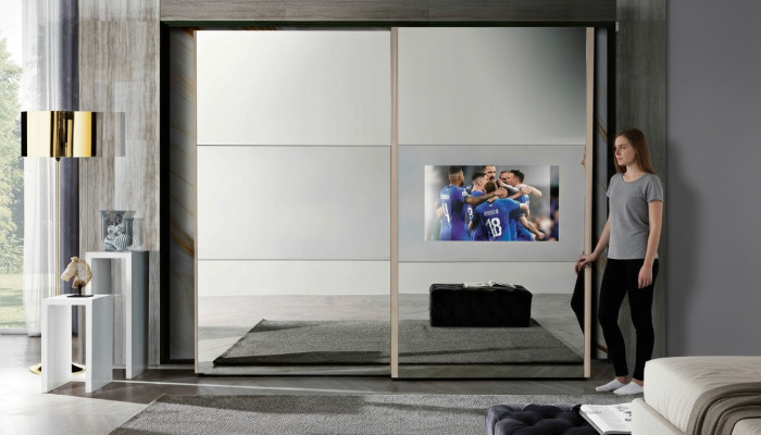 Armario armarios armario de ropa de lujo de madera con puertas correderas de TV con televisor.