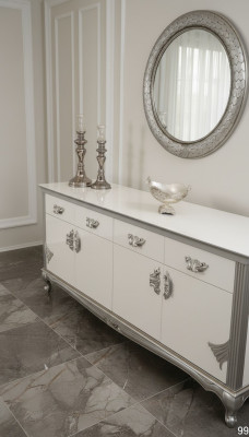 Cómoda blanca con cajones prácticos y estantes elegantes.