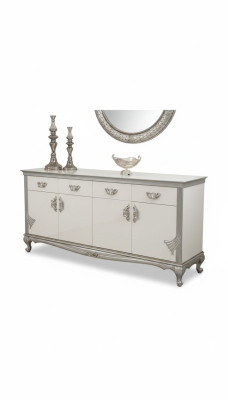 Cómoda blanca con cajones prácticos y estantes elegantes.