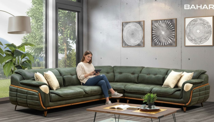 Diseño de sofá en forma de L con acolchado de lujo para salón estilo suave.