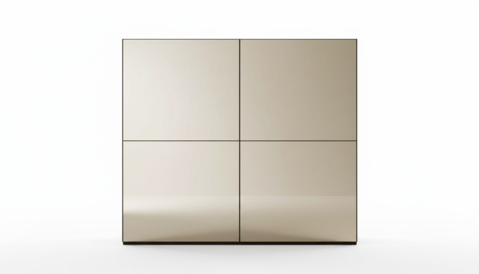 Elegante armario de espejo con puertas correderas en estilo moderno.
