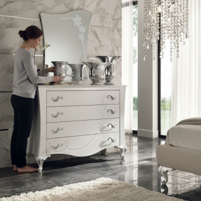 Cómoda con espejo de madera en estilo moderno para el dormitorio.