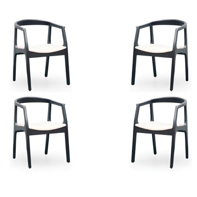Conjunto de 4 sillas de diseño de madera y textil con tapizado para comedor o restaurante.