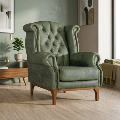 Silla de lujo Chesterfield verde, sillón tapizado de diseño con apoyabrazos.