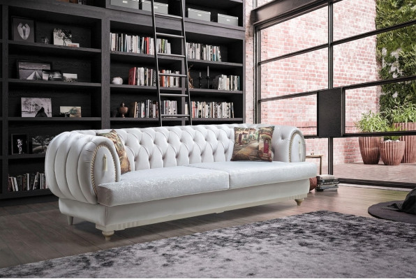 Sofá Chesterfield blanco de tres plazas en un estilo moderno y elegante para la sala de estar.