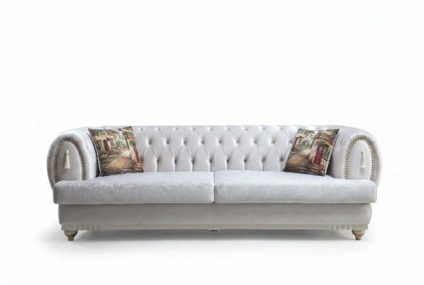 Sofá Chesterfield blanco de tres plazas en un estilo moderno y elegante para la sala de estar.