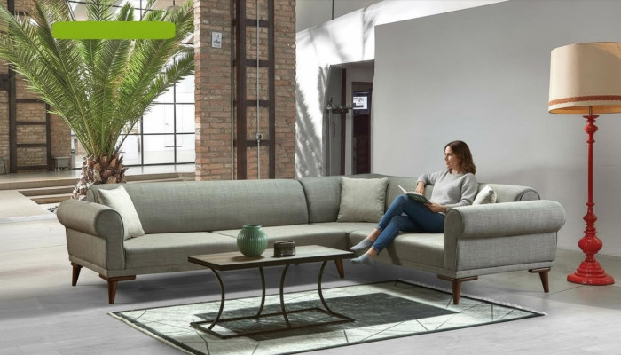 Sofá esquinero en forma de L con acolchado de lujo para sala de estar, estilo suave, color gris.