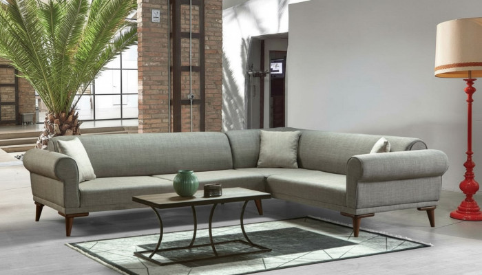 Sofá esquinero en forma de L con acolchado de lujo para sala de estar, estilo suave, color gris.