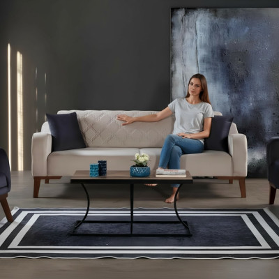 Sofá de tres plazas beige elegante para la sala de estar en terciopelo.