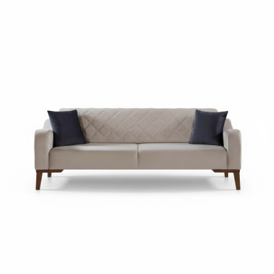Sofá de tres plazas beige elegante para la sala de estar en terciopelo.