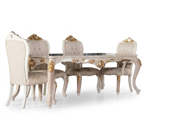 Grupo de 4 sillas de comedor de madera estilo muebles.