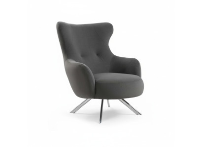 Sillón orejero de lujo de una plaza tapizado de diseñador en tela moderna.
