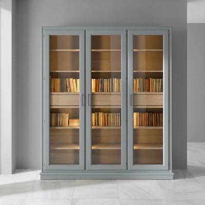 Armario de libros gris con puertas de cristal - Elegante solución de almacenamiento para su colección de libros.