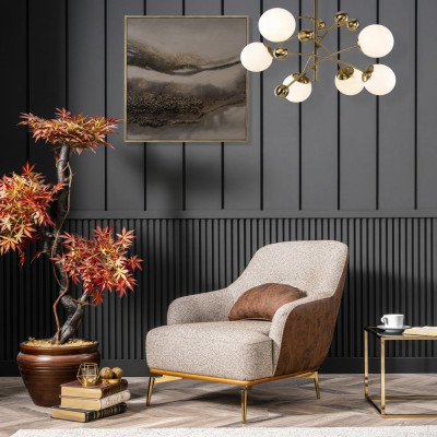 Sillón orejero moderno de tela de poliéster gris para salón de diseño.