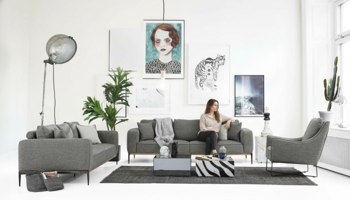 Sofá 2 plazas moderno de tela en gris para la sala de estar.
