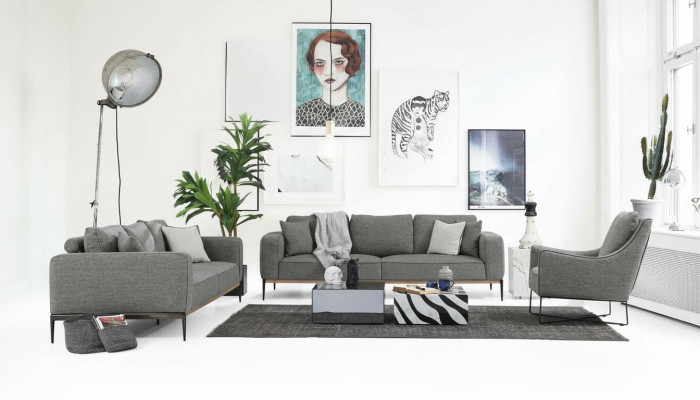 Sofá 2 plazas moderno de tela en gris para la sala de estar.