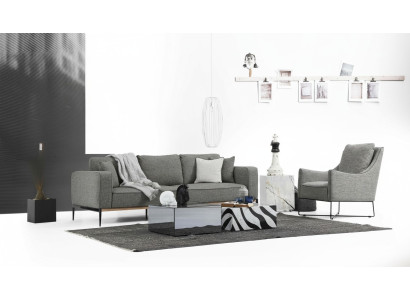 Sofá de 4 plazas con butaca de tela en diseño moderno de color gris.