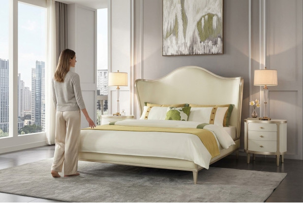 Juego de dormitorio moderno con cama doble y mesitas de noche.