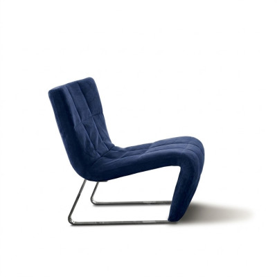 Sillón sin apoyabrazos, diseño de lujo tapizado en estilo italiano con tela azul.