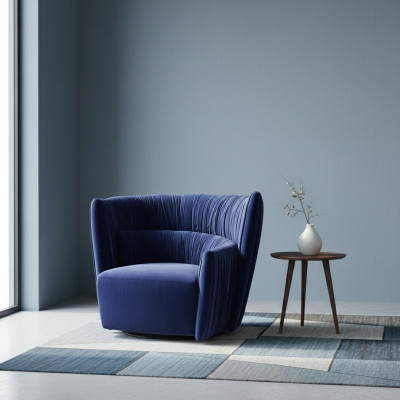 Sillón individual de estilo italiano, tapizado en madera y textil de lujo en color azul.