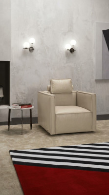 Sillón individual acolchado diseñador tejido asiento cuero moderno gris.