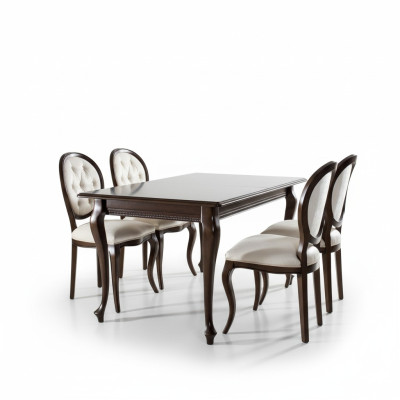 Mesa de comedor de madera marrón oscuro con 5 sillas clásicas de cuero Chesterfield de diseñador.