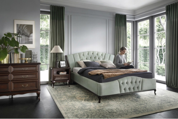 Cama Chesterfield verde con muebles de dormitorio de madera Camas Reales.
