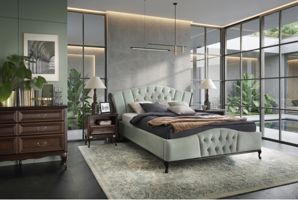 Cama Chesterfield verde con muebles de dormitorio de madera Camas Reales.