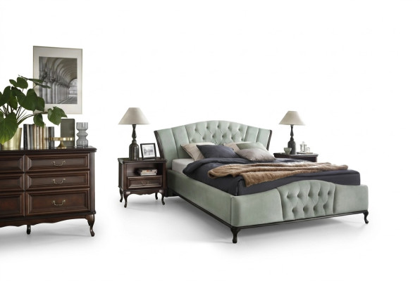 Cama Chesterfield verde con muebles de dormitorio de madera Camas Reales.